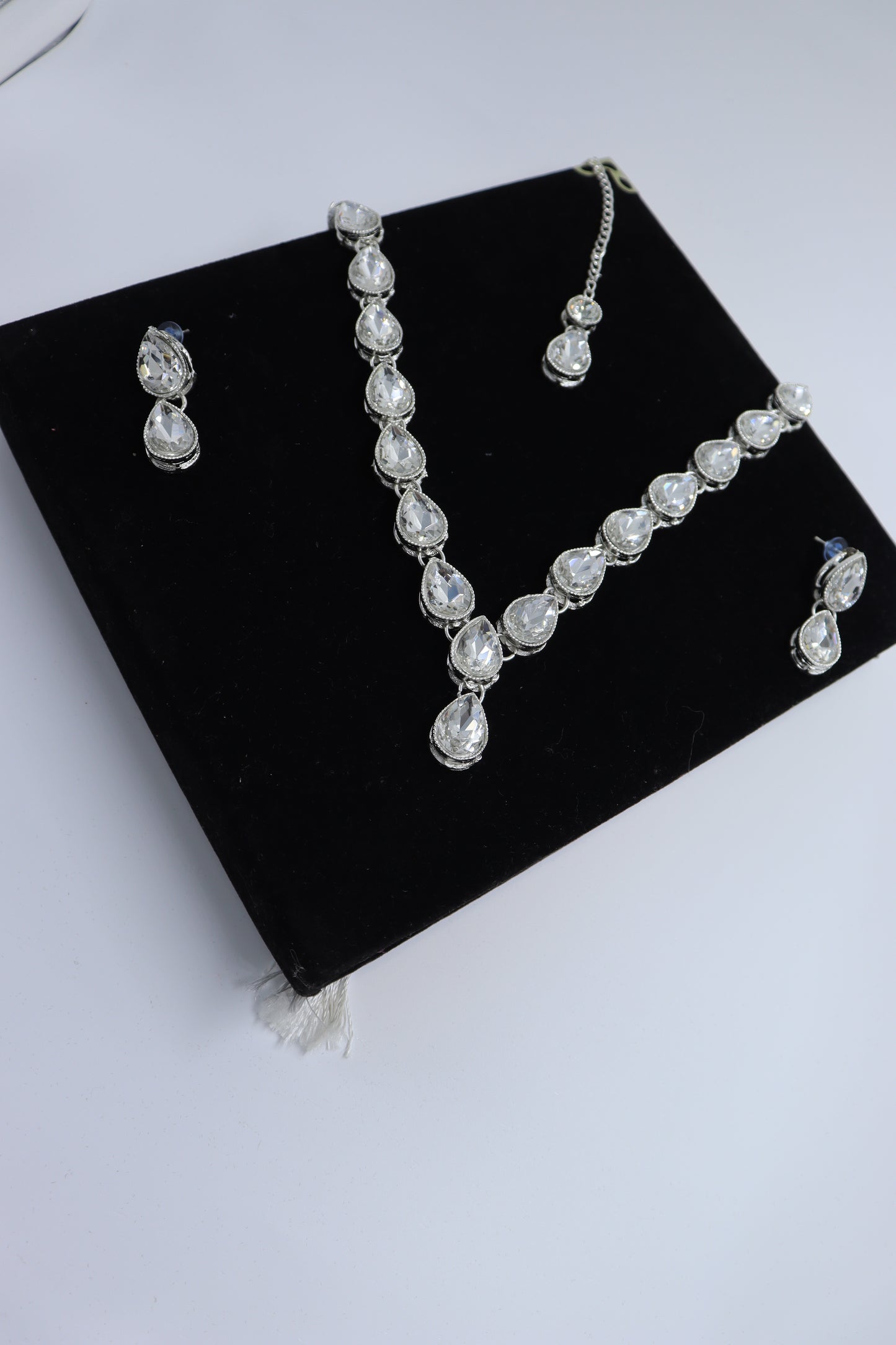 stone studded silver neck piece