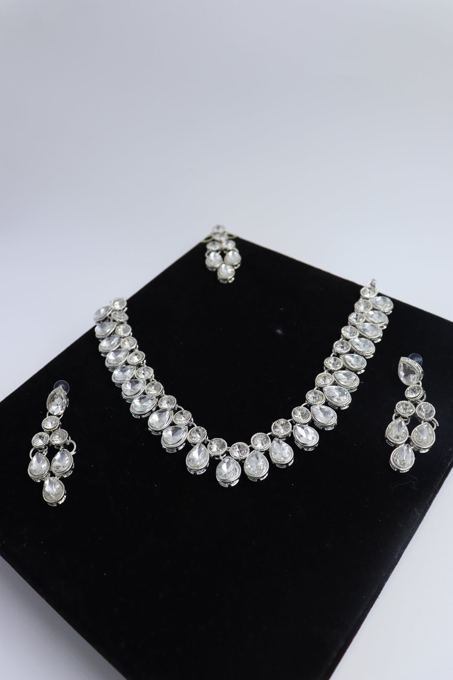 stone studded silver necklace